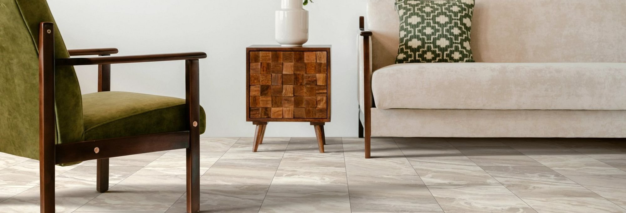 vinyl flooring, green armchair and white sofa