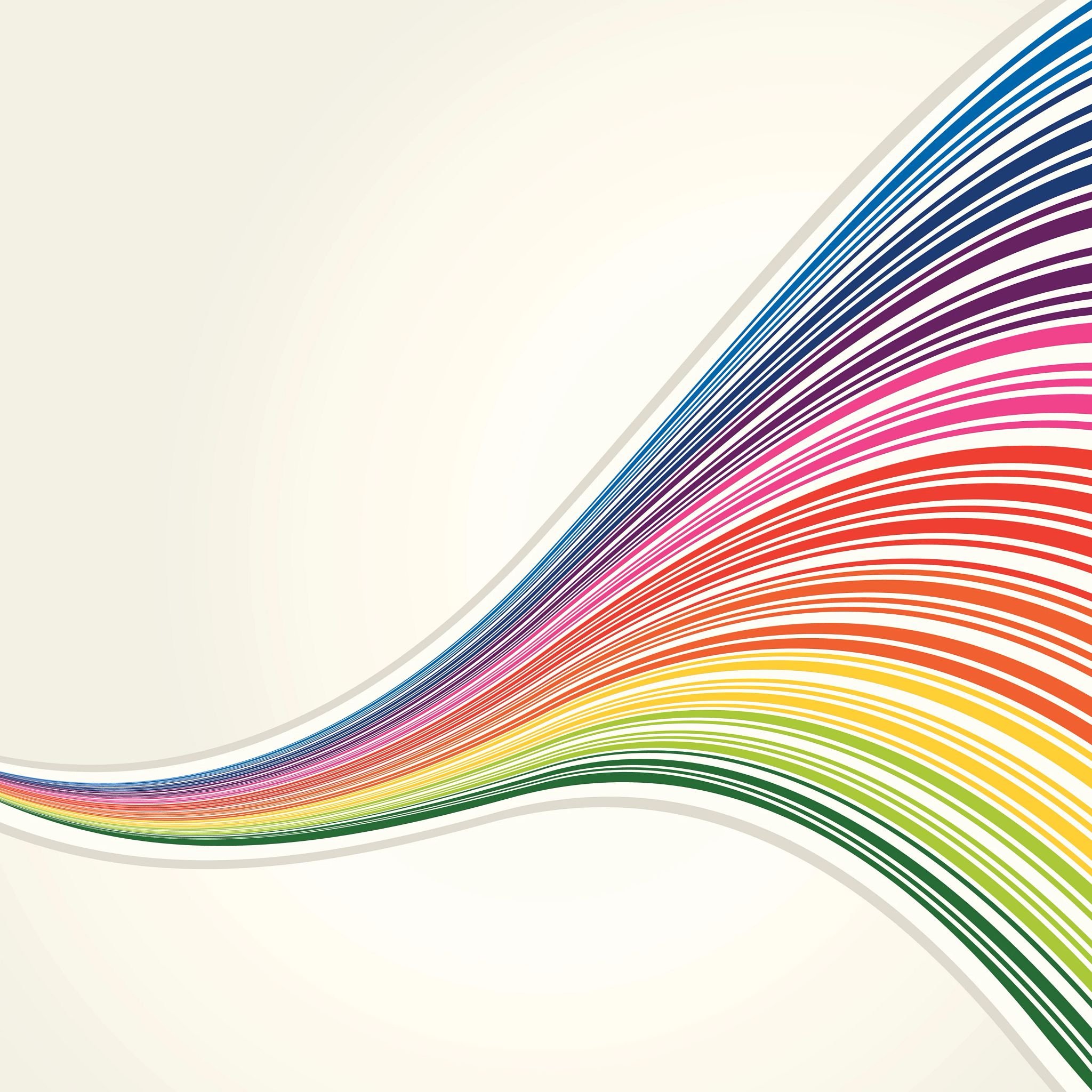 spectrum of rainbow colours on a beige background